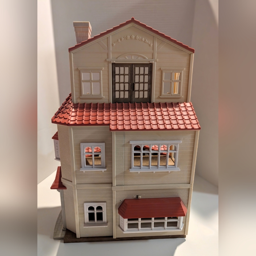Elegant Dollhouse with Red Roof and Cream Walls